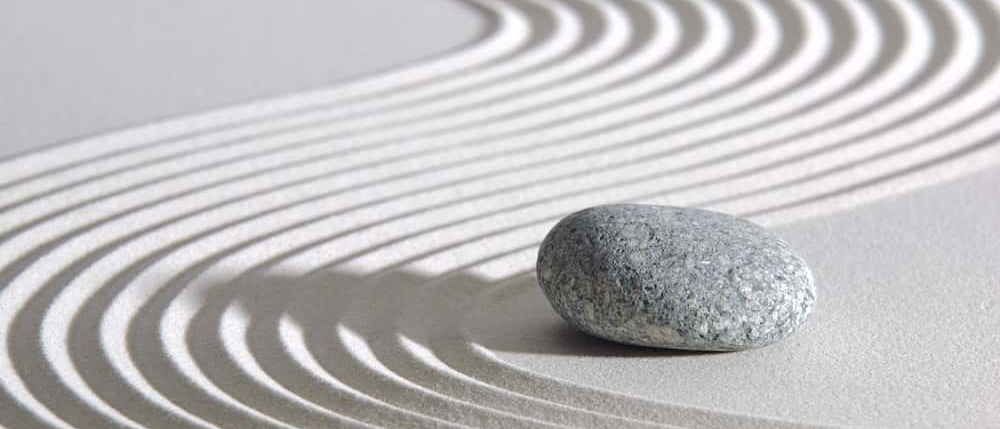 Stone in sand garden